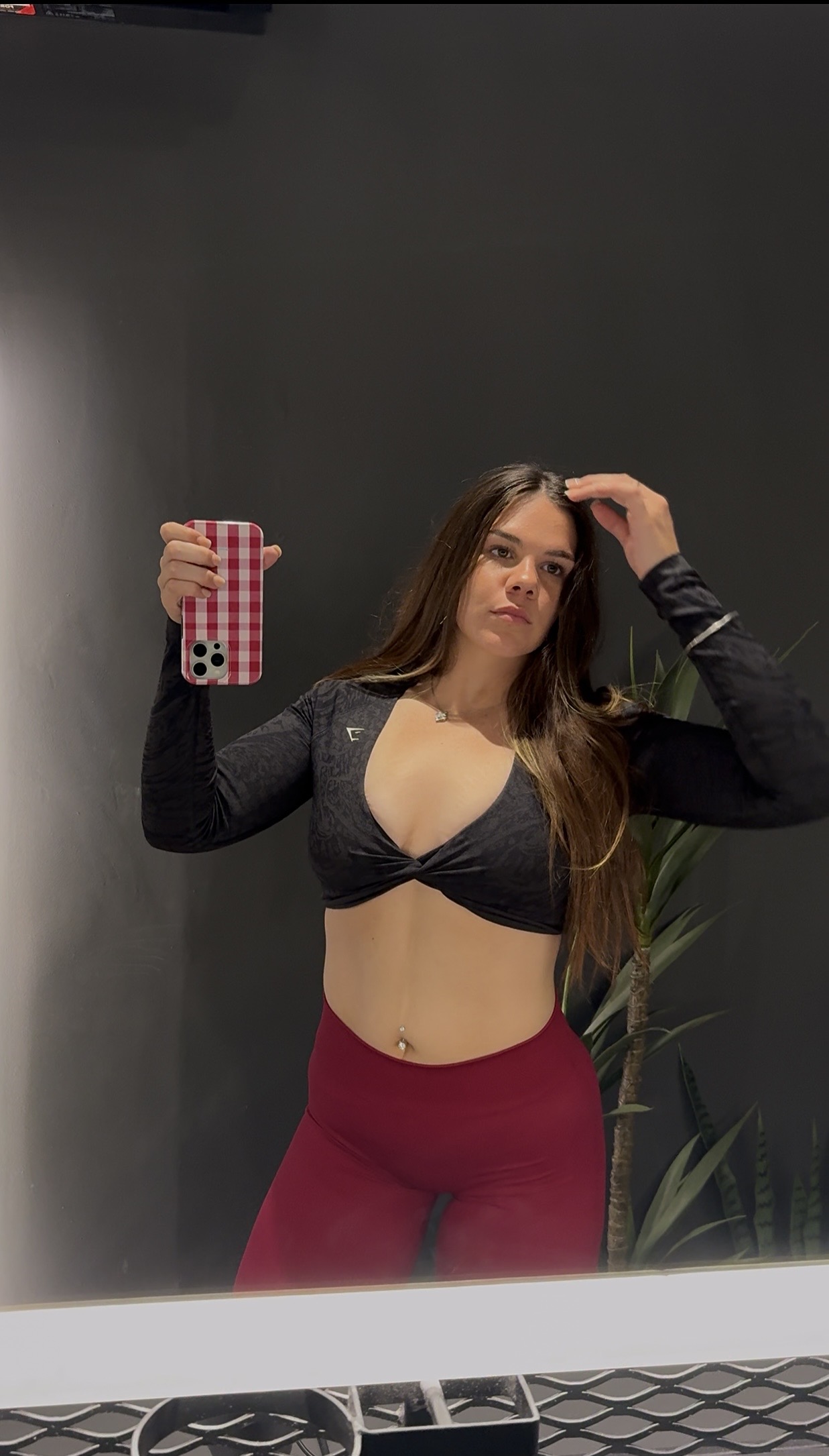 Layla later in her fitness journey, wearing gym clothes
